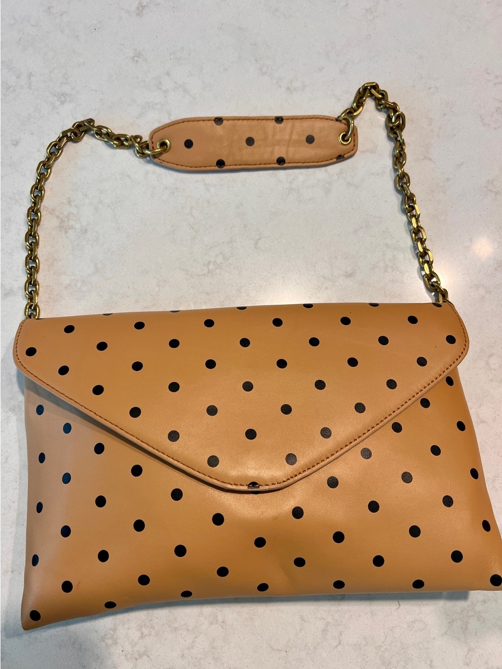 The Invitation Envelope Clutch (convertible shoulder bag).